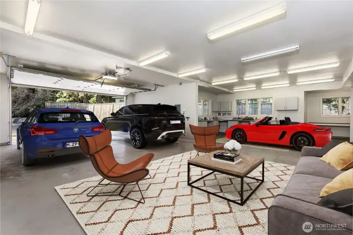7+ car attached garage with mechanics dream amenities. Virtually staged.