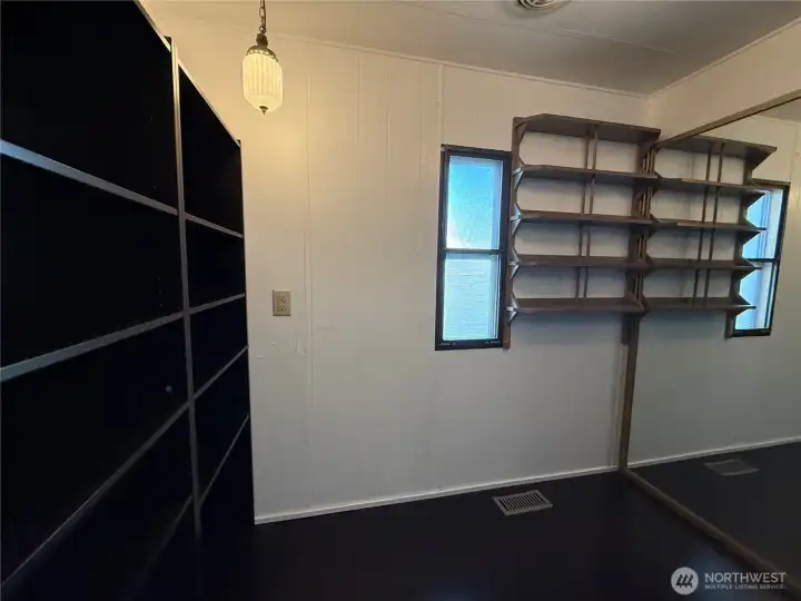 Walk-in closet off primary bedroom