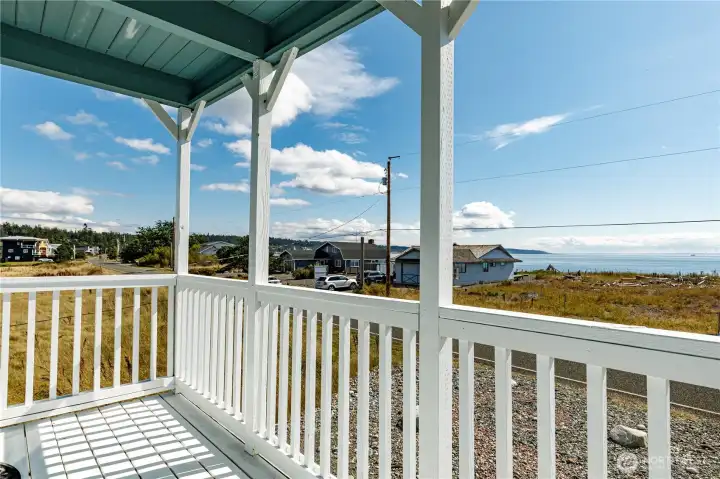 Front porch looks South to the sound, Olympic Mountains and Ferry crossing
