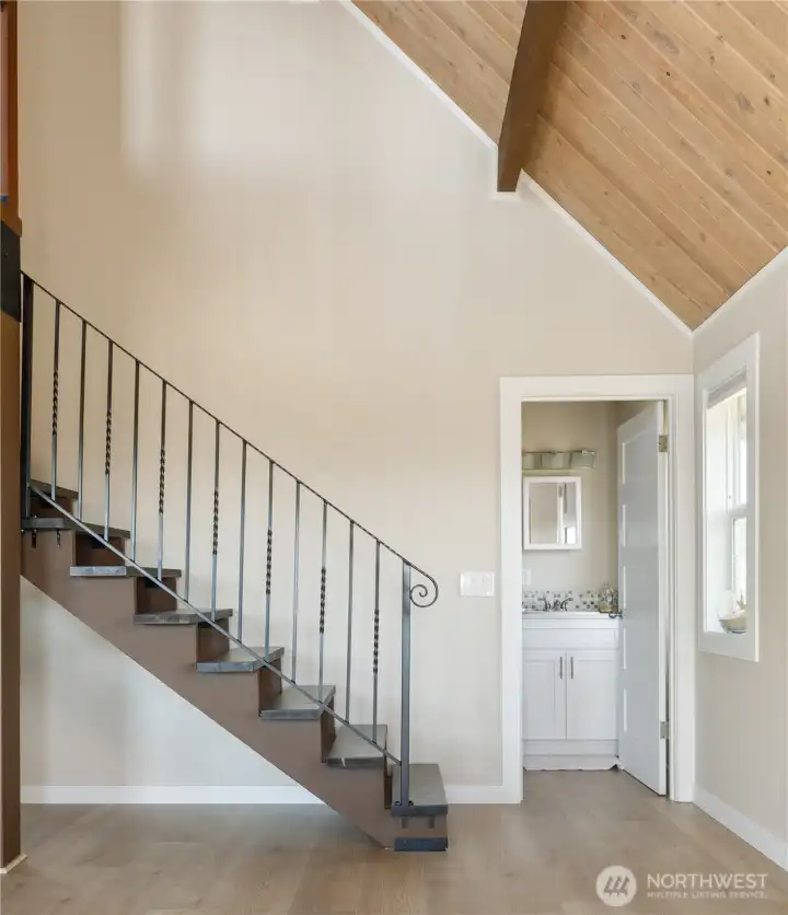 Custom staircase, full bathroom