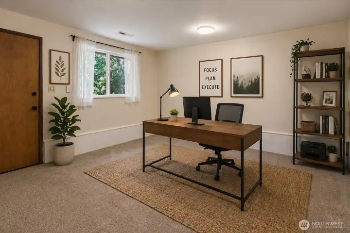 Secind of two rooms that would make a great den, craft room, etc (virtually staged)