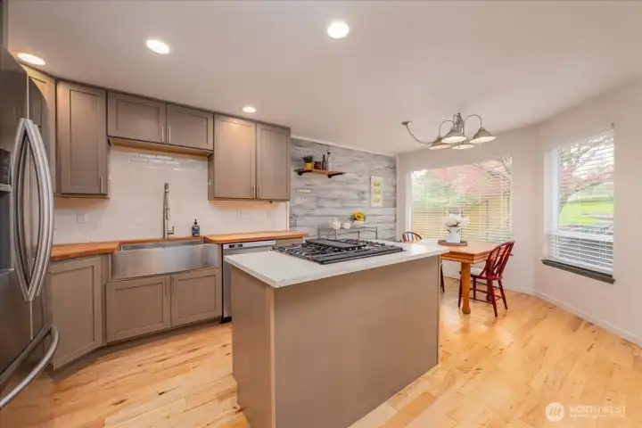 Dinning area allows for beautiful views of the backyard. WArm sunlight greets you in the morning.