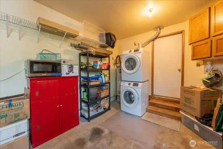 Signal car garage and stackable washer & dryer.