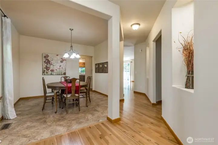 Formal dining room and main hallway, adorned with wall niches to display your favorite artwork.