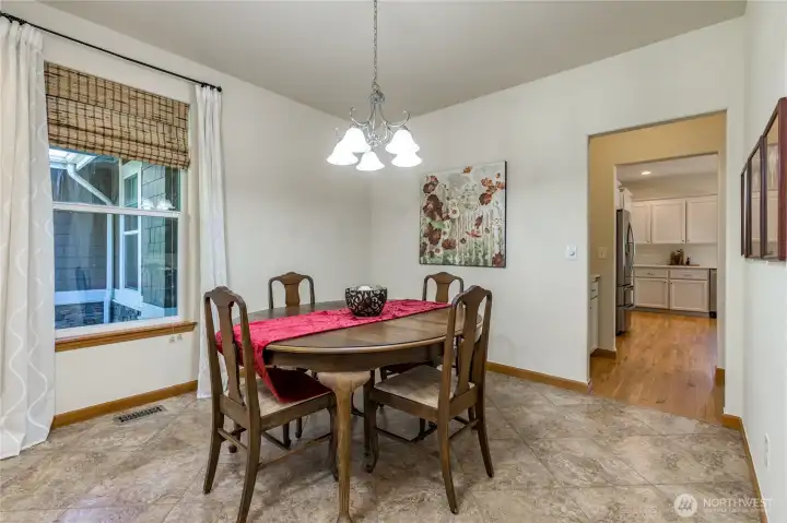 Formal dining room connects to kitchen with a convenient butler's pantry.