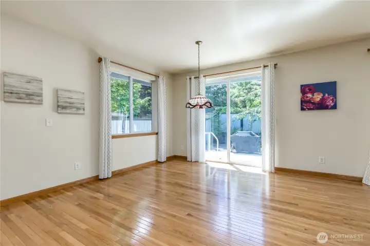 Breakfast nook off the kitchen & family room with slider to back patio