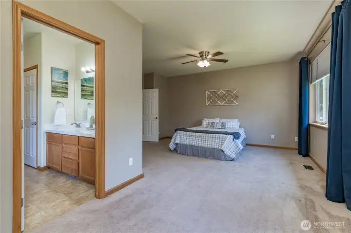 Primary bedroom retreat complete with a spacious attached 5-piece ensuite.