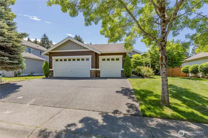 Attached 3-car garage located in a fantastic, walkable neighborhood with sidewalks and a community park.
