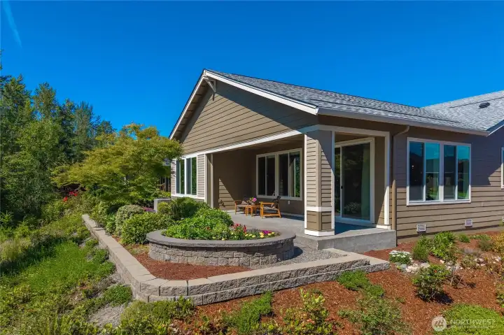 This elevated, sun drenched lot enjoys beautiful Western and Southern territorial views over permenant greenspaces.