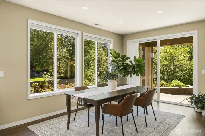 With no immediate neighbor to the South, this home enjoys beautiful green vistas, immense privacy and natural light!