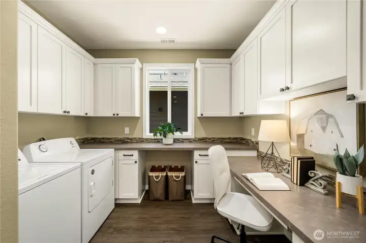 The beloved Smart Space offers laundry, work and craft space and tons of storage.