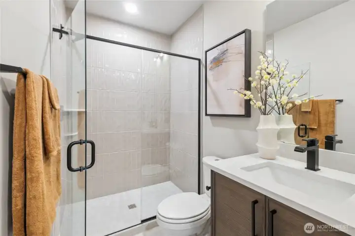 Guest bathroom on lower level. For marketing purposes ONLY. Colors and Features may vary. MODEL PICTURES Guest bathroom on lower level. For marketing purposes ONLY. Colors and Features may vary. MODEL PICTURES
