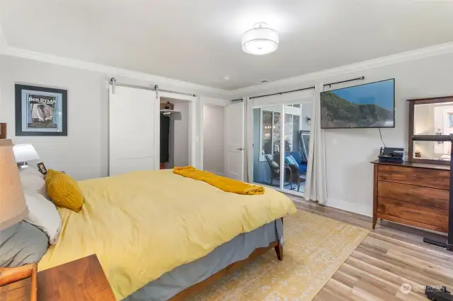 Primary Suite with private patio entrance and large walk in closet.