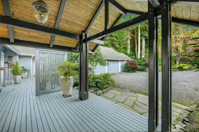 Front porch with wraparound deck. Oversized 2 car garage.