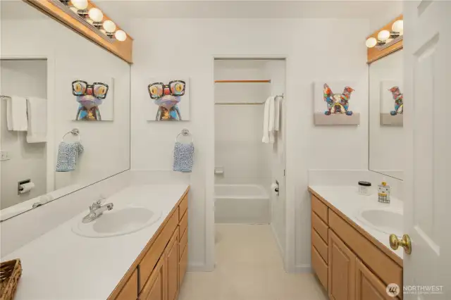 Family bathroom with double vanities and separate WC/Shower for maximum convenience.