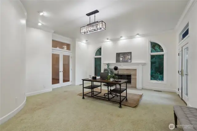 Main floor office with fire place and veiws