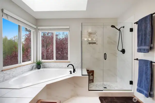 Primary bathroom; Shower w/marble tile, soaking tub, and heated floors.