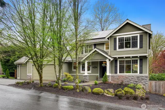 Another angle of the front of the property, with professional landscaping.
