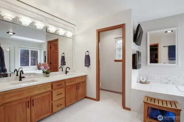 Double sinks, radiant heated floors.