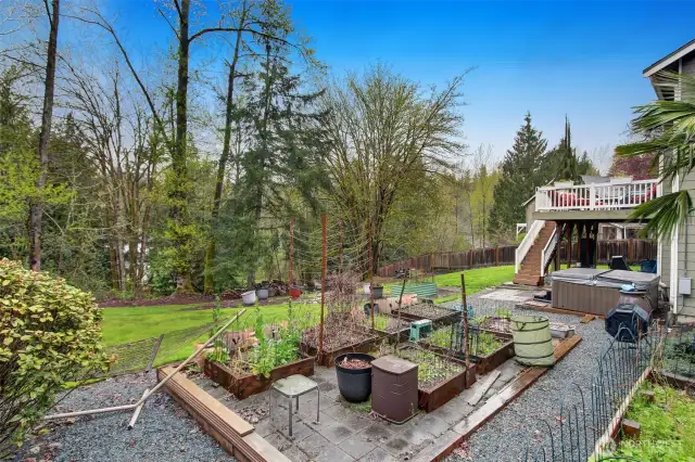 Gardening space, hot tub off the large deck.