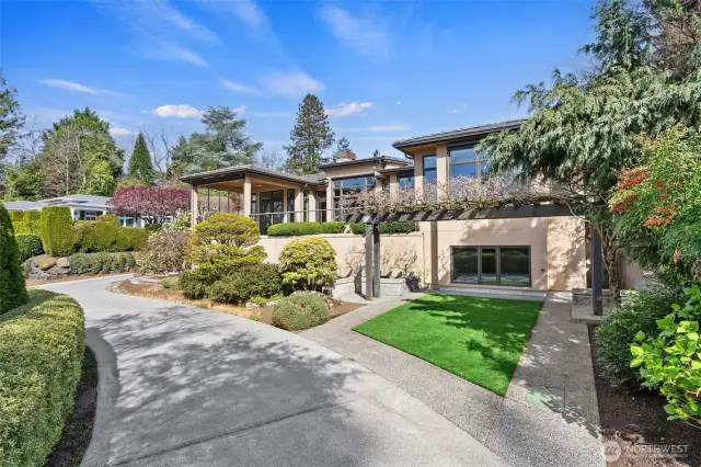 A private driveway offers serenity, ample parking, and newly installed turf—blending convenience with everyday enjoyment.