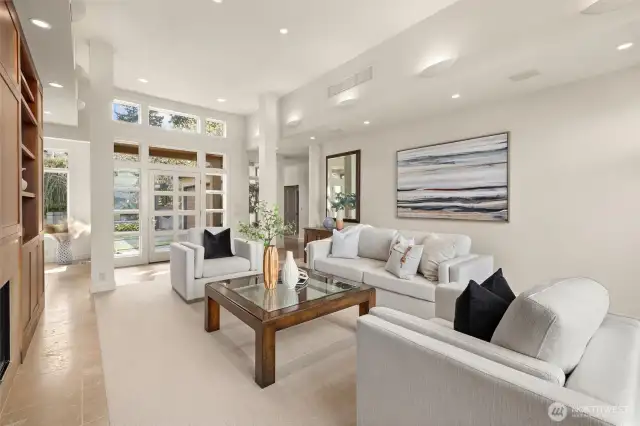 Limestone flooring, soaring ceilings, and contemporary touches come together to create a space that’s both elegant and current.