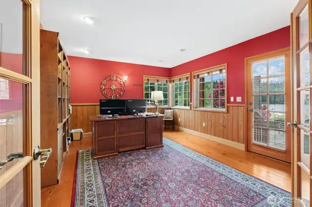 French doors into large office with access to back patio.