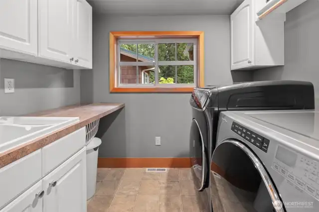 Laundry room with sink, storage and counter space on 2nd floor.