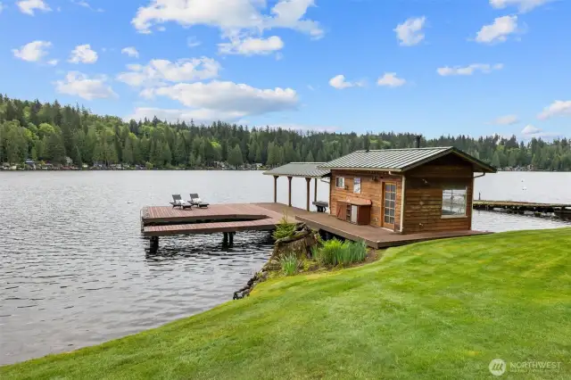Private dock with boat cover and lift. Also includes a 1/2 bath with composting toilet and spacious room with wood burning stove.  Also has a storage area for all your summer fun toys!
