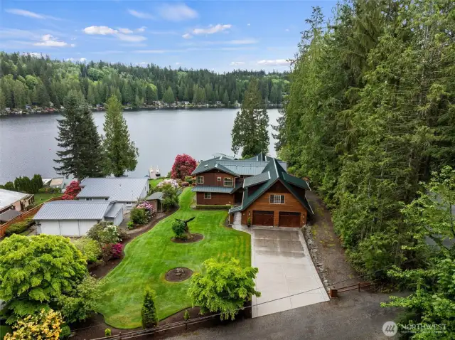 Overview of home on 1.3 acres and 156ft of lakefront.