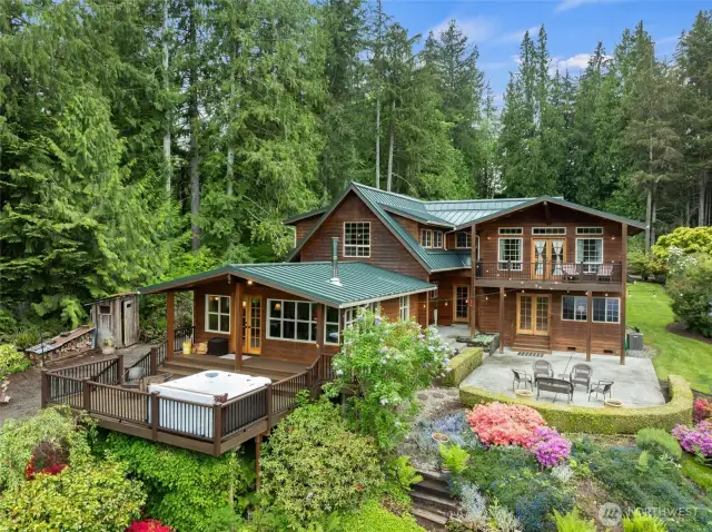 Hot tub on spacious deck and large patio for those summer nights.