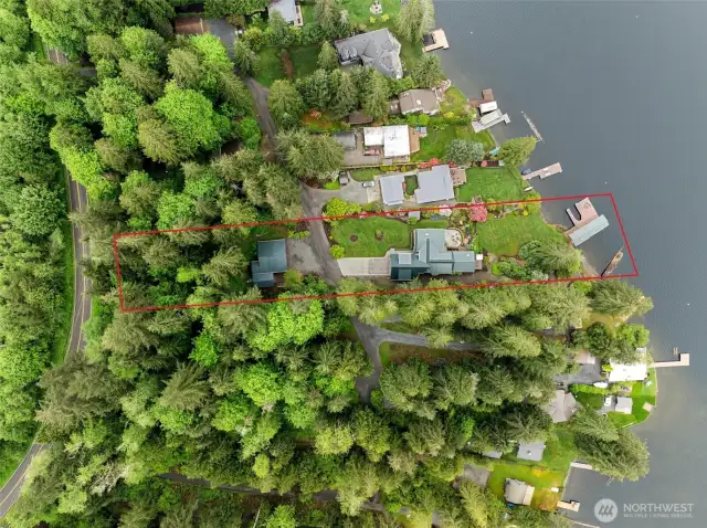 Lake side retreat with 1.3 acres.
