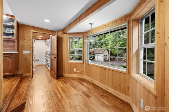 Large walk-in pantry and cozy kitchen nook.