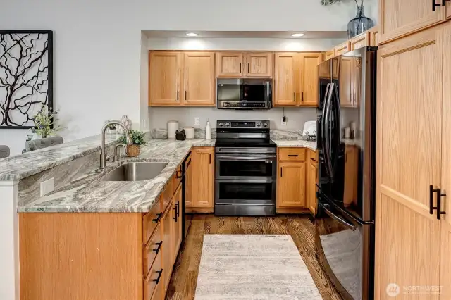 Newer stainless steel appliances (2023). Convection double oven w/ built-in air fryer options.
