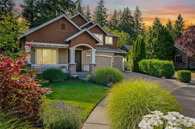 Elegant curb appeal with manicured landscaping.