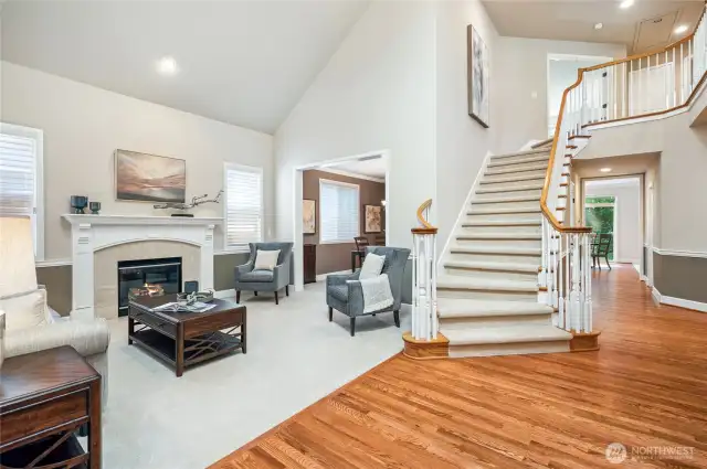 Grand curved staircase makes a striking statement.