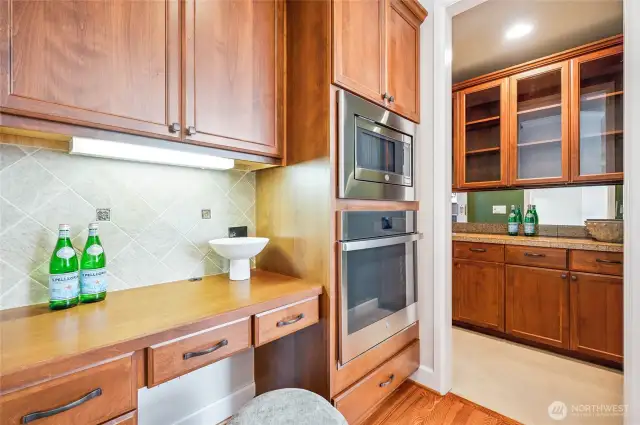 Butler’s bar and built in workspace offers added function and flair.