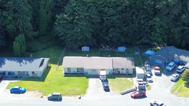 Aerial view of the property and trees