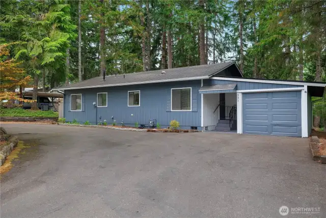U shaped driveway welcomes you home.