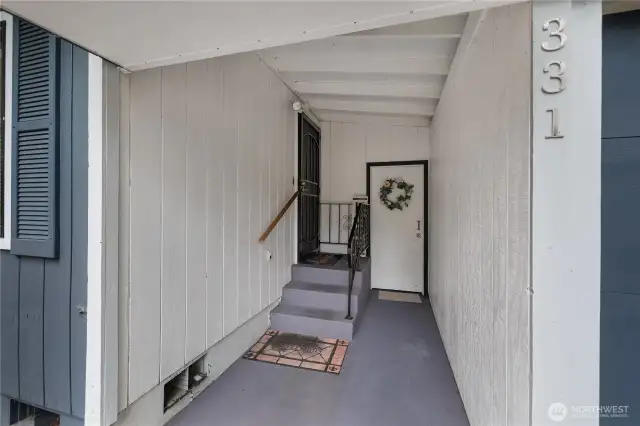 Covered breezeway with attached garage