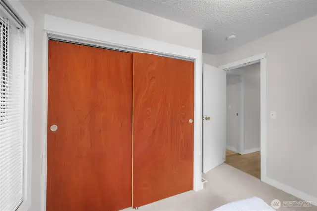 Sliding closet doors in bedroom 2