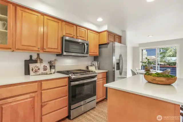 Quartz counters and stainless appliances.