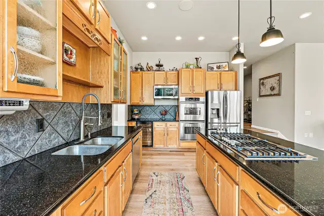 Kitchen island with seating and granite countertops