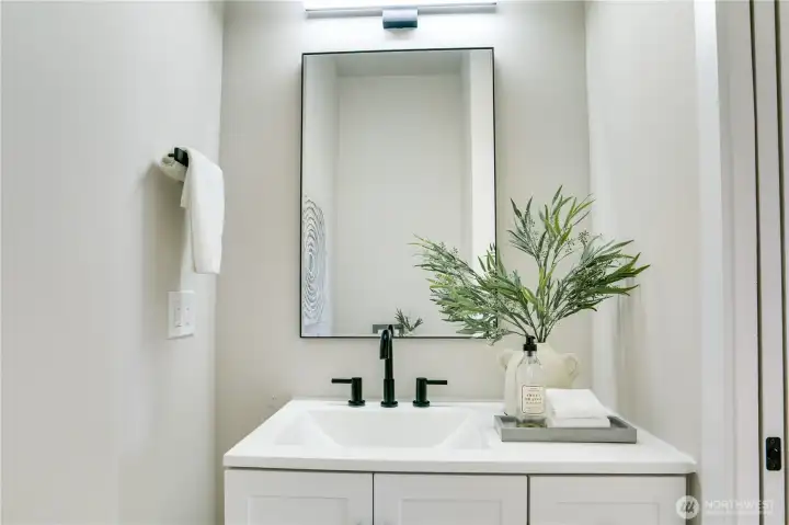 This stylish 1/2 bath is located on the main floor.
