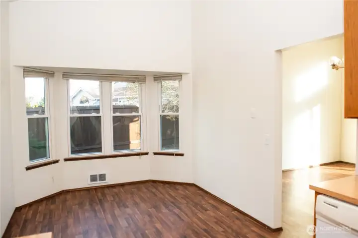 Vacant dining room with beautiful bay window!