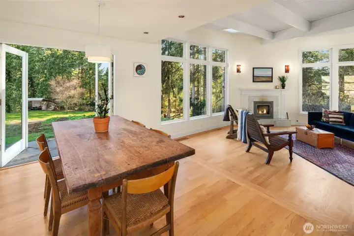 This room is stylish and embracing with tons of natural light. You will love eating in the dining area then retiring to the lower level living space for relaxing conversations. This house lives and entertains so graciously.