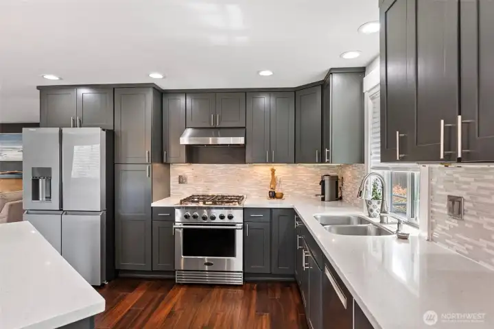 Lots of counter space, light and bright for all tasks and an uninterrupted island for other tasks and creations Lots of counter space, light and bright for all tasks and an uninterrupted island for other tasks and creations