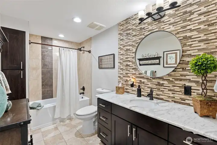 A full upstairs bath works well for guests that stay. Not just as a powder but for those that have hot tubbed and want a shower before leaving. A full upstairs bath works well for guests that stay. Not just as a powder but for those that have hot tubbed and want a shower before leaving.