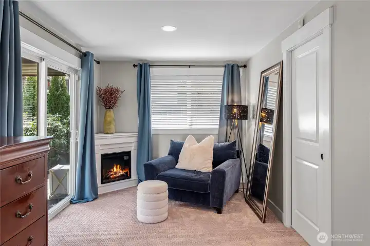 A sitting area, electric fireplace and door out to the back deck spell convenience and lifestyle A sitting area, electric fireplace and door out to the back deck spell convenience and lifestyle