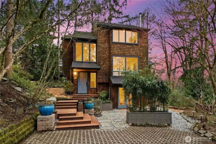 Charming home with shingle-siding.